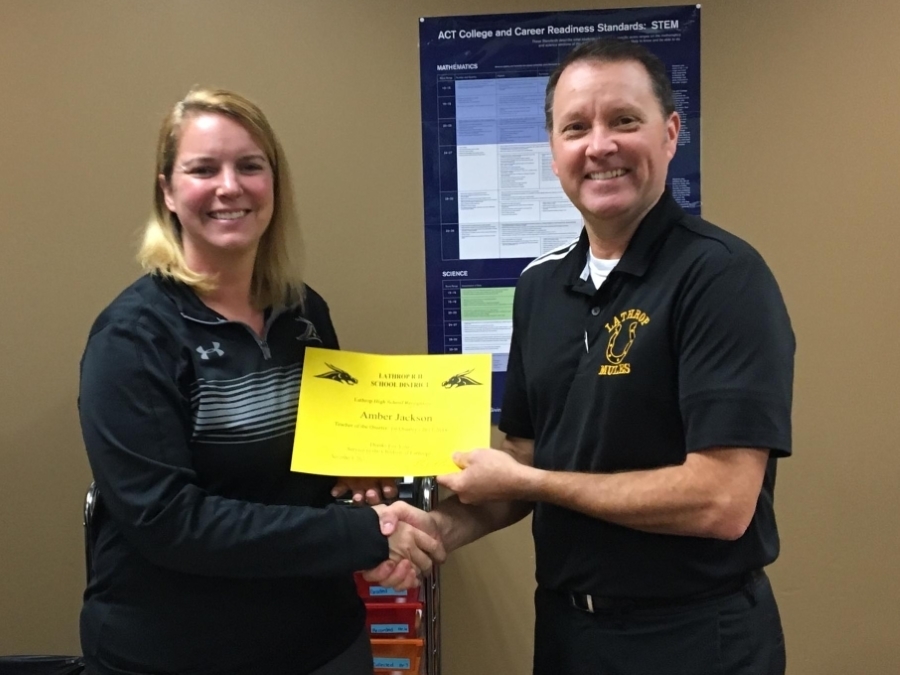 Mrs. Jackson receiving her award for LH Teacher of the Quarter